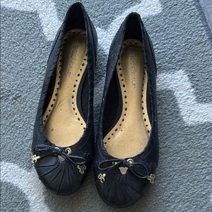 NWOT  BCBG Black Ballet flats with gold detail in women’s size 6